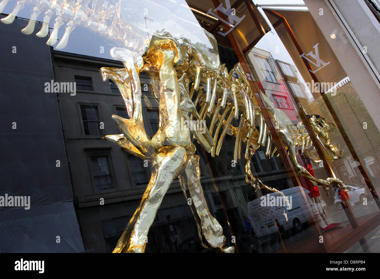 Dinosaur themed window display at Louis Vuitton`s flagship store in New